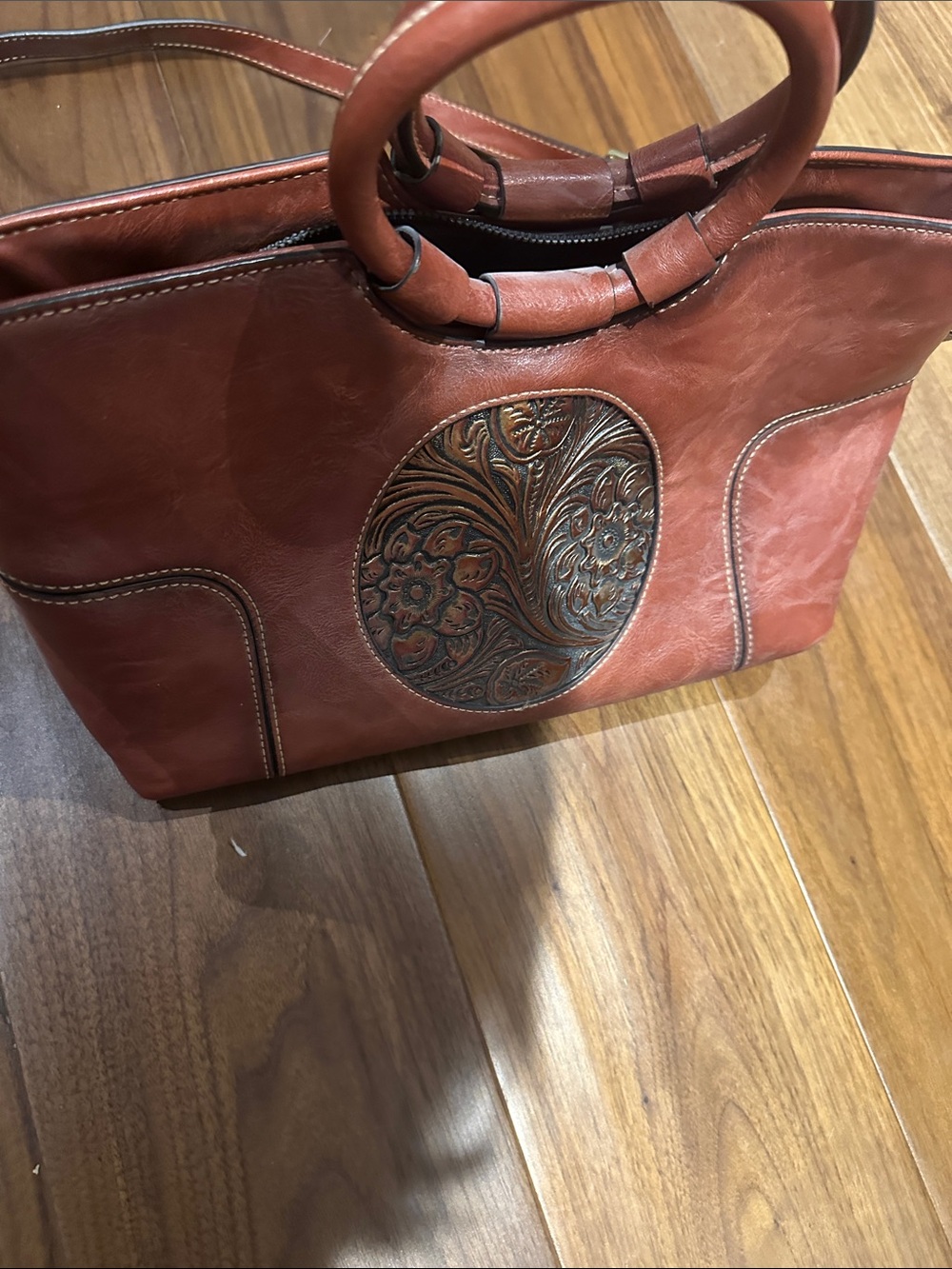Women's Brown Leather Tote Bag with Embossed Floral Medallion